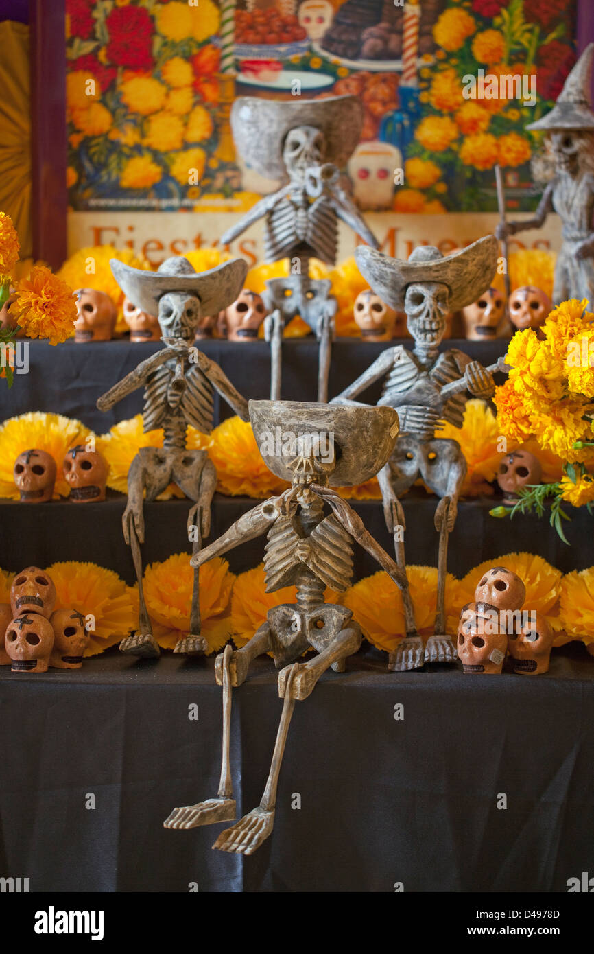 Handcarved wood skeleton musicians on display during Day of the Dead at Mujeres Artesanas gift store, Oaxaca, Mexico. Stock Photo