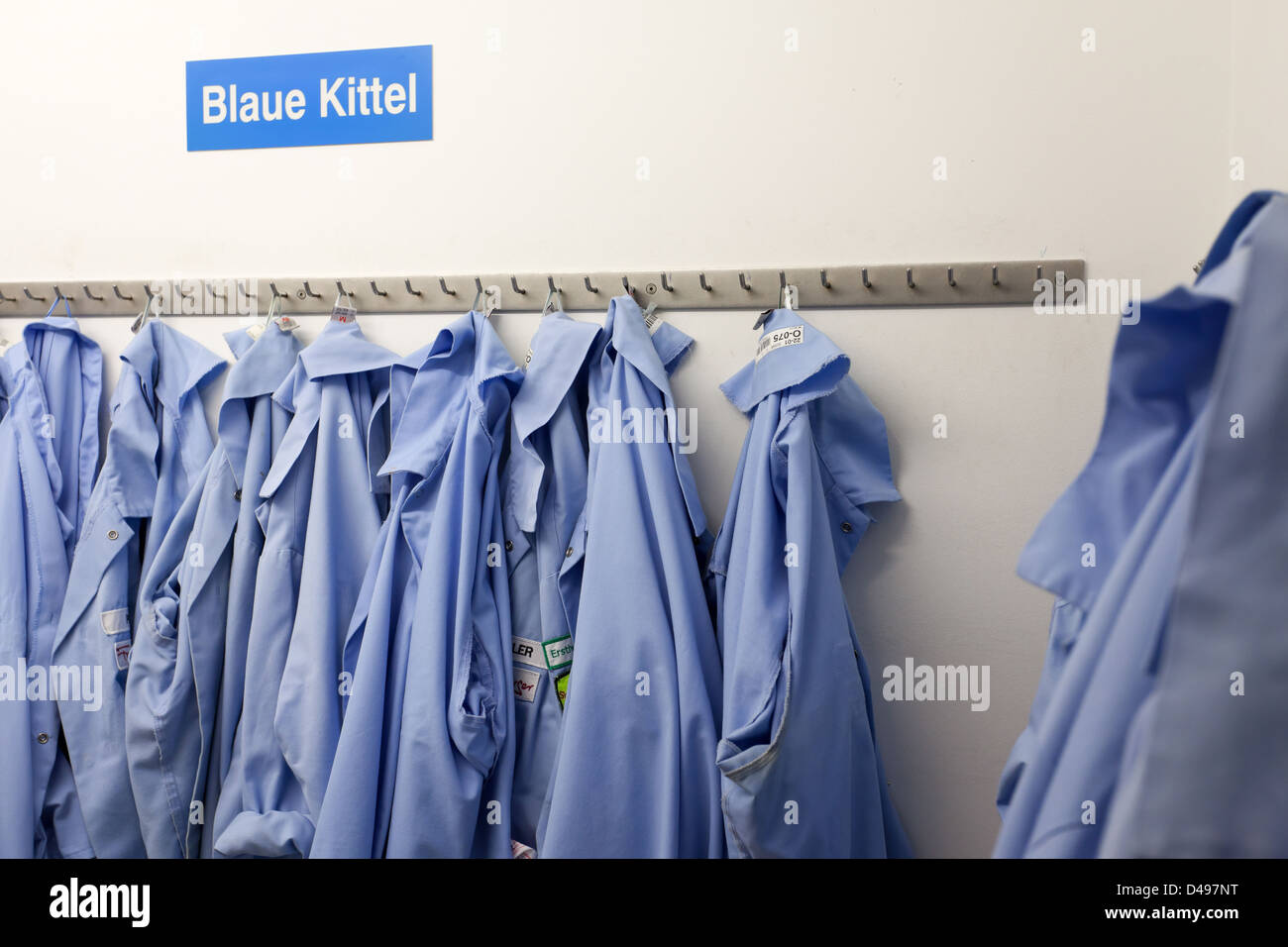 Berlin, Germany, Blue Shield coat in a locker room at Freiberger food Stock Photo