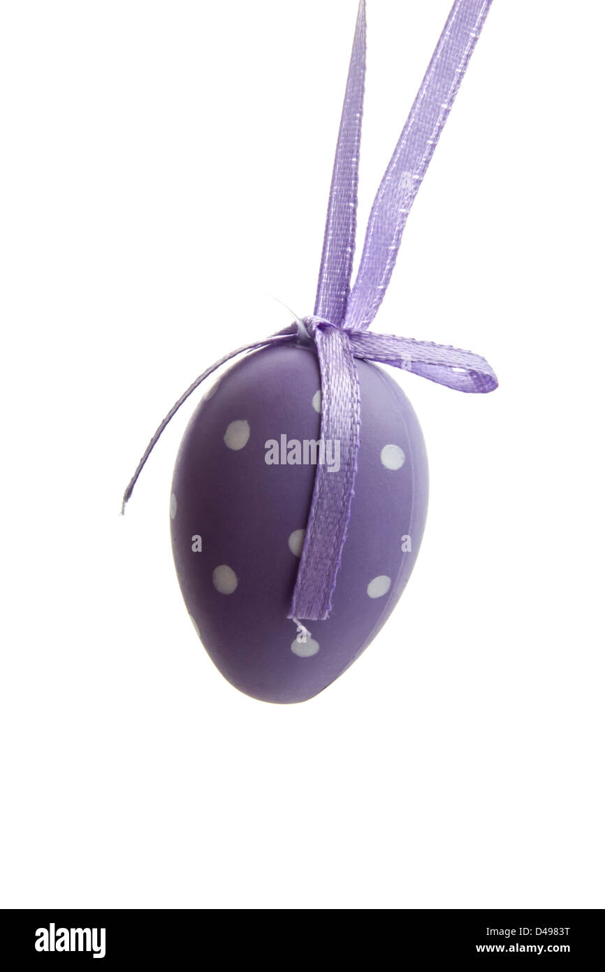 Purple easter egg isolated on white background Stock Photo - Alamy
