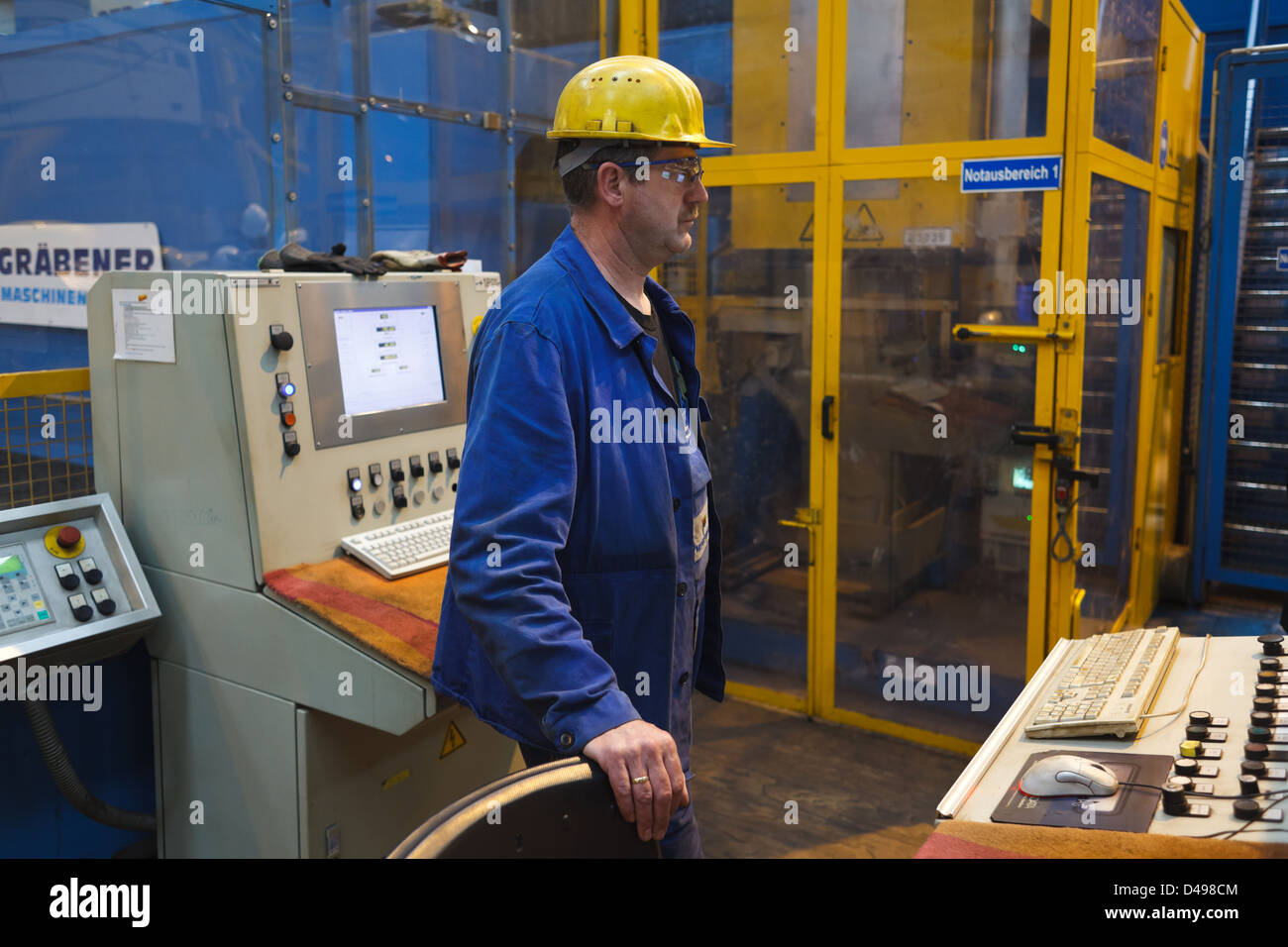 Papenburg, Germany, Meyer Werft GmbH, an employee of the Meyer Werft shipyard in the halls Stock Photo