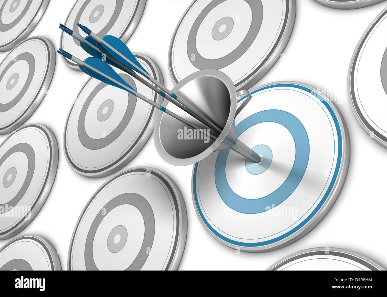 Many targets and a blue one pierced by three arrows thanks to a funnel Stock Photo