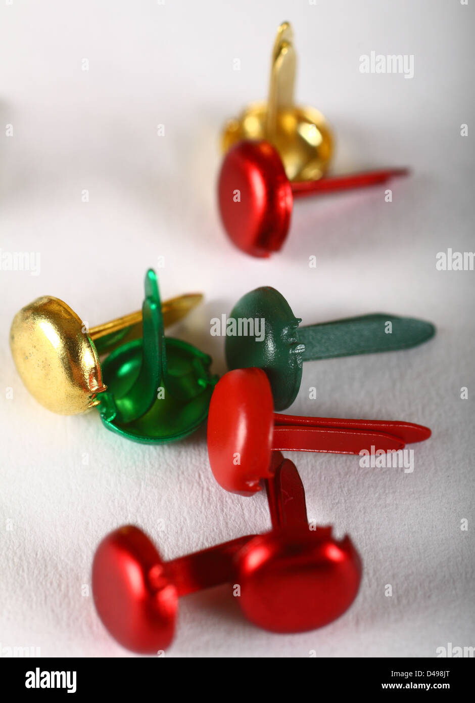 Selection of colourful crafting brads Stock Photo Alamy