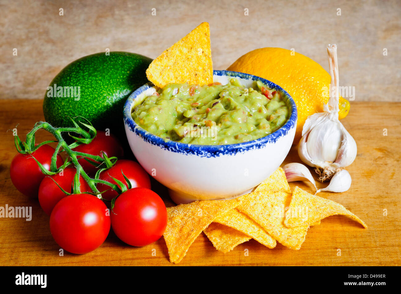 Avocado guacamole dip and ingredients Stock Photo Alamy