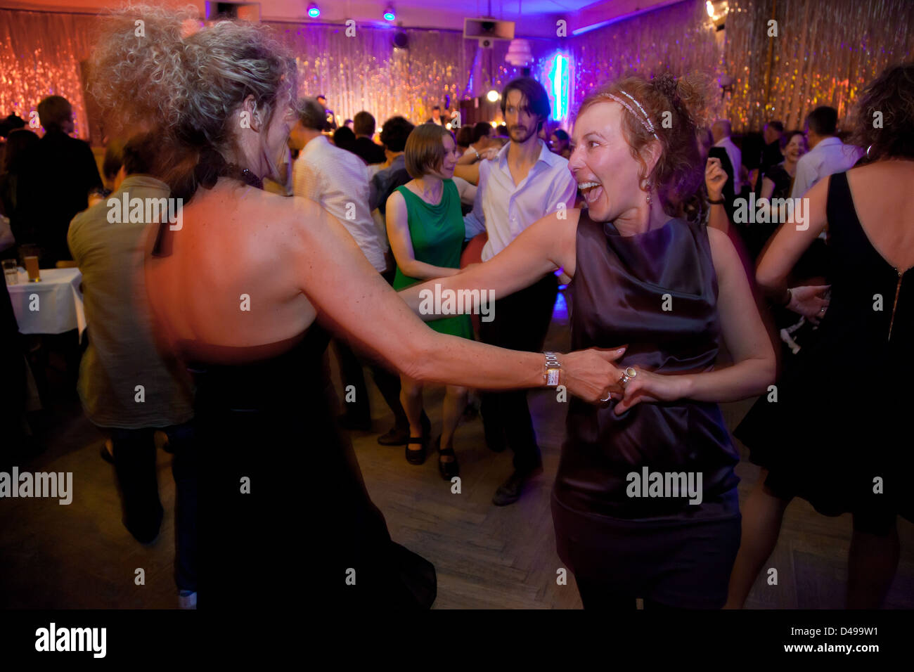 Berlin, Germany, Swing Dancing guests at dinner in Clärchens Ballhaus