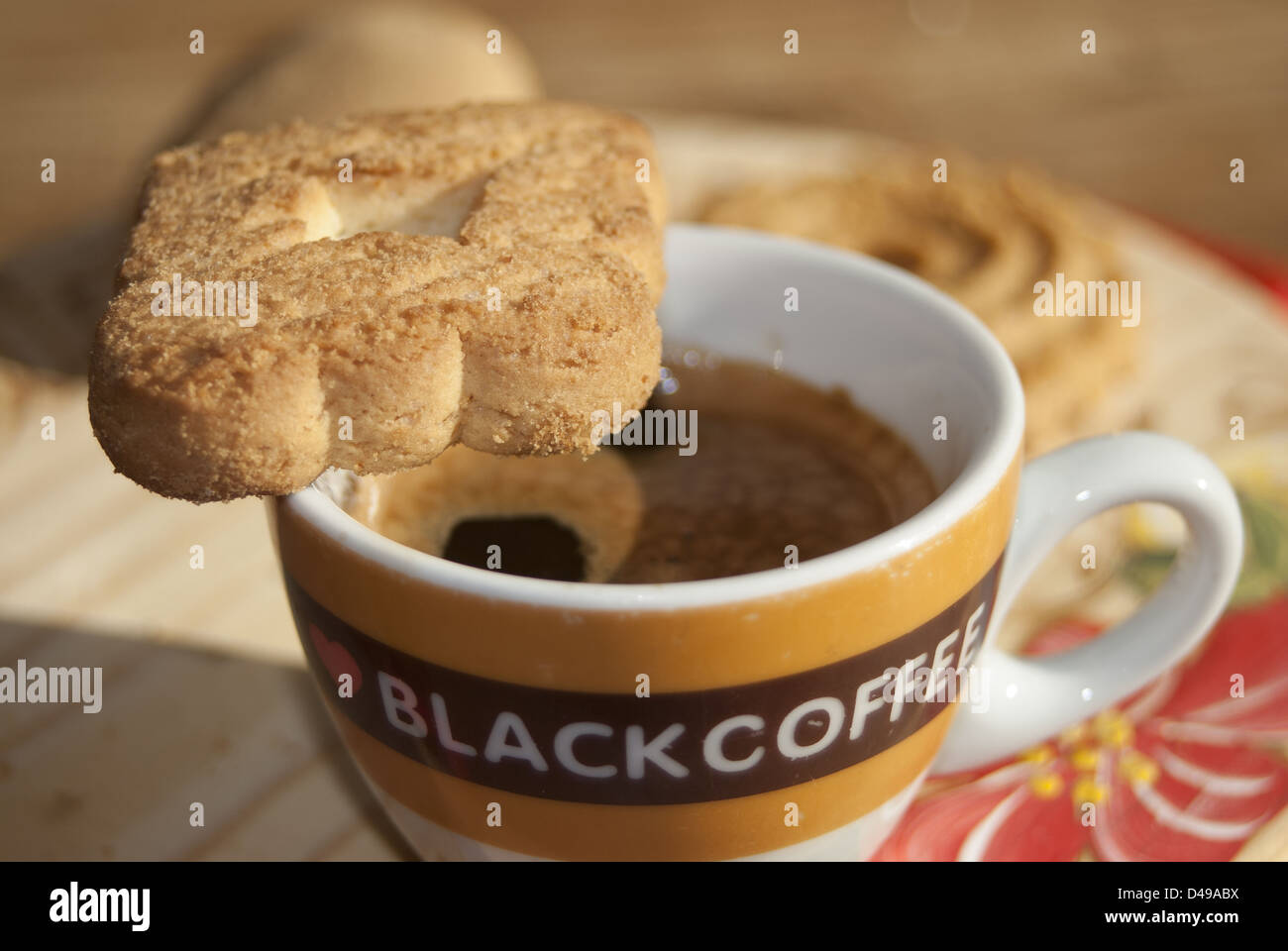 Italian breakfast: espresso and biscuit Stock Photo - Alamy