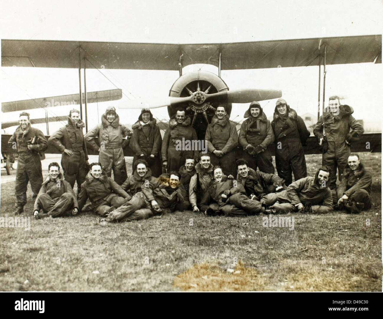 This photograph from the 1921-22 NCO Pilots Course at Netheravon depicts the training of non-commissioned officers in the Royal Air Force. The course was part of the RAF's early flight training program, aimed at preparing NCOs for roles as pilots during the interwar period. Stock Photo
