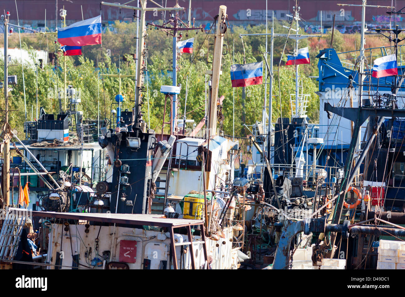 Masts with Russian flags in the Russian port of Murmansk Stock Photo