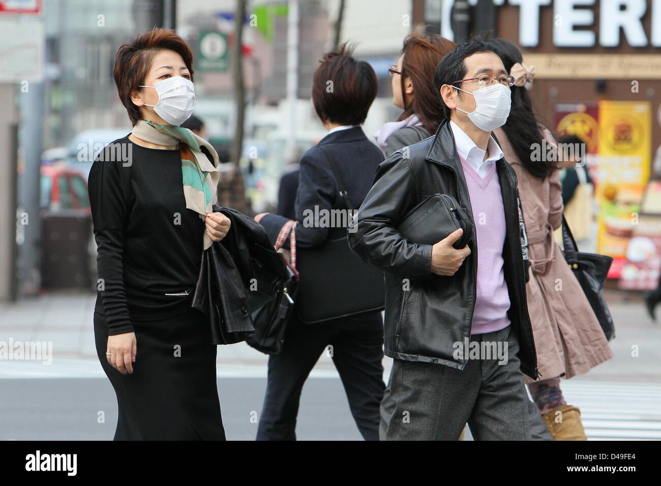 March 8, 2013, Tokyo, Japan : People wear protective face masks in ...
