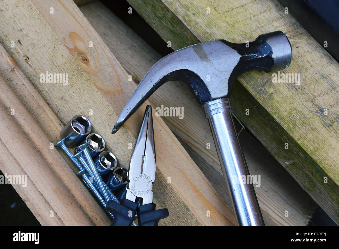Pliers with a Hammer Stock Photo Alamy