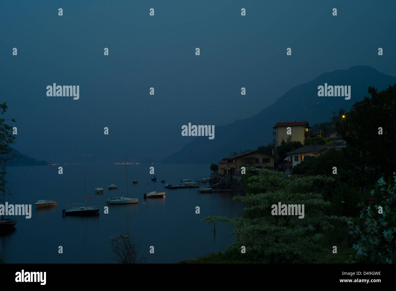 Italian Lakes, Lake Como, July 2010. Nightfall on the attractive village of Lezzeno on Lake Como, Italy. Stock Photo