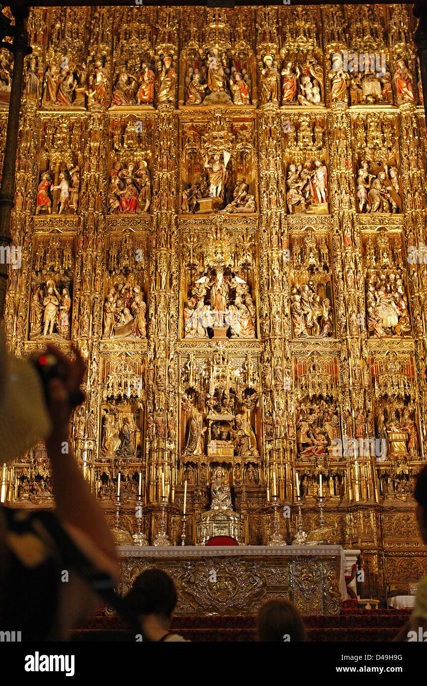 Seville, Spain, with high altar retablo in the Cathedral of Seville Stock Photo