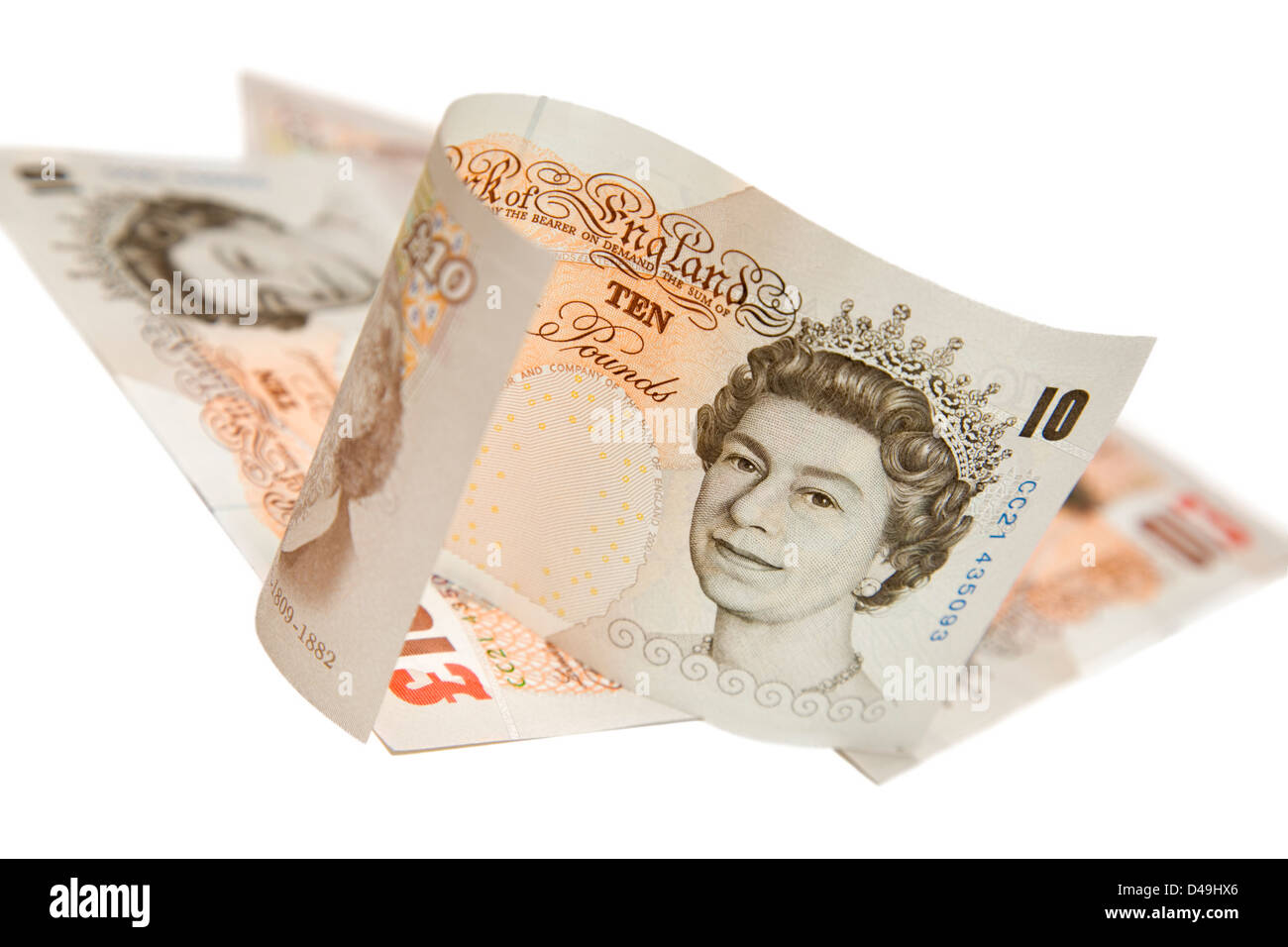 Selective focus on several ten pounds note on white Stock Photo