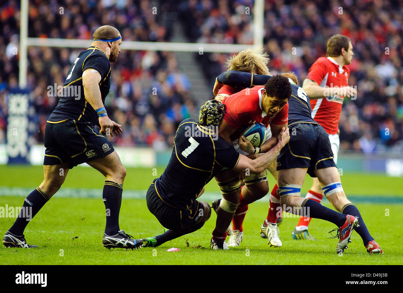 Edinburgh, Scotland, UK. 9th March 2013. Kelly Brown (7) tackles Toby Faletau, Scotland v Wales, RBS 6 Nations Championship, Murrayfield Stadium 09/03/13 (c) Colin Lunn/ Alamy Live News Stock Photo