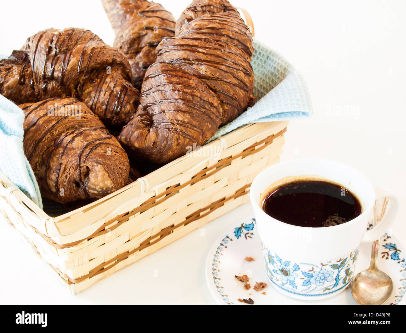 The dough is layered with butter, rolled and folded several times in
