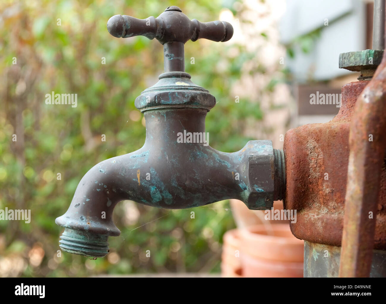 A functional but rusty water spigot Stock Photo