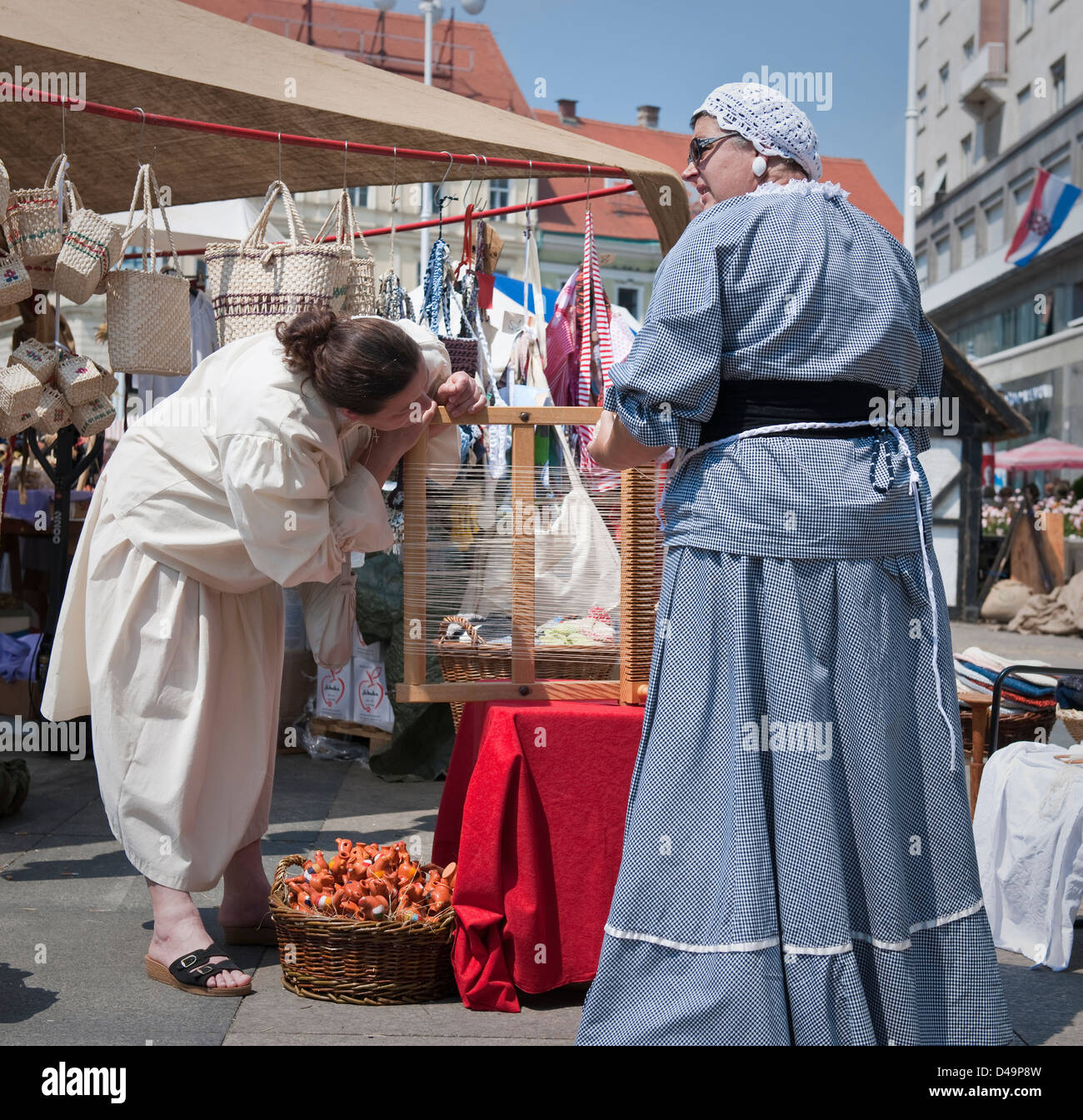 Women weaving at the medieval folk festival,Zagreb,Croatia Stock Photo