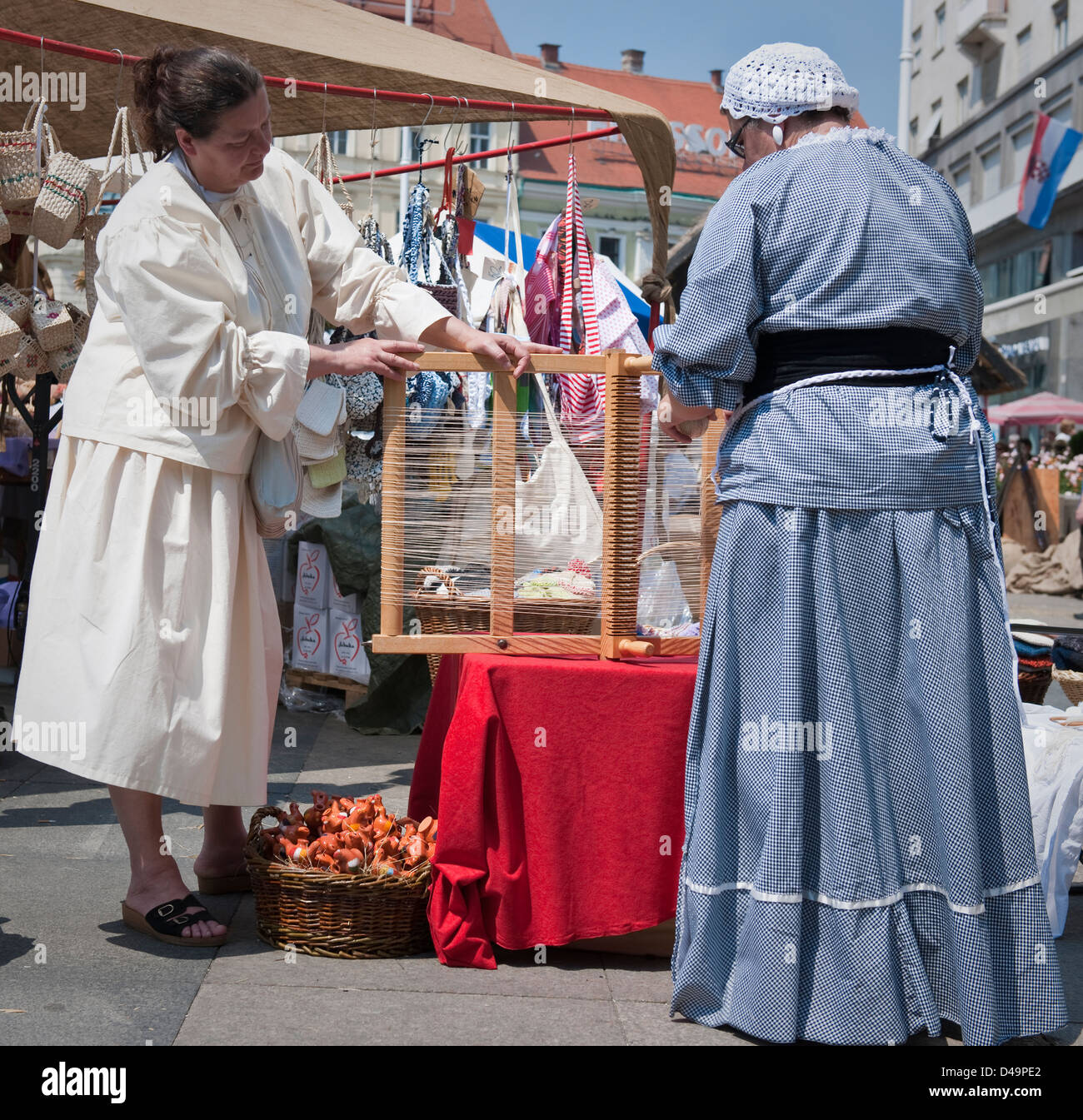 Women weaving at the medieval folk festival,Zagreb,Croatia Stock Photo