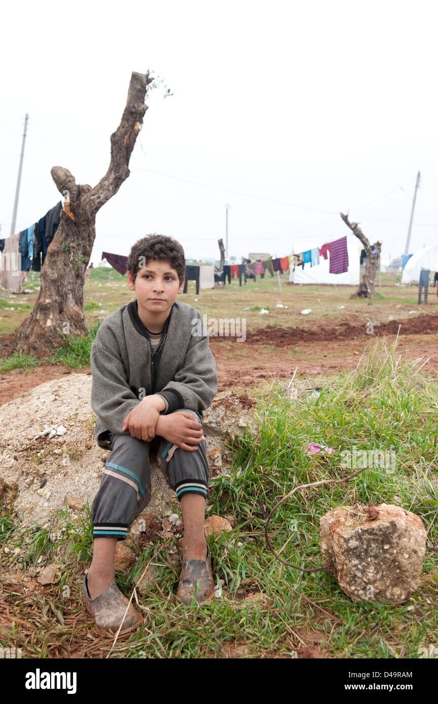 A boy in the Azaz Refugee Camp on the Turkish border, Syria Stock Photo