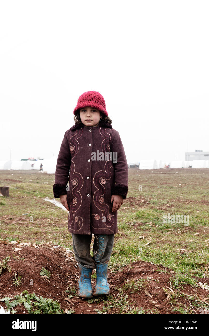 A girl in the Azaz Refugee Camp on the Turkish border, Syria Stock Photo