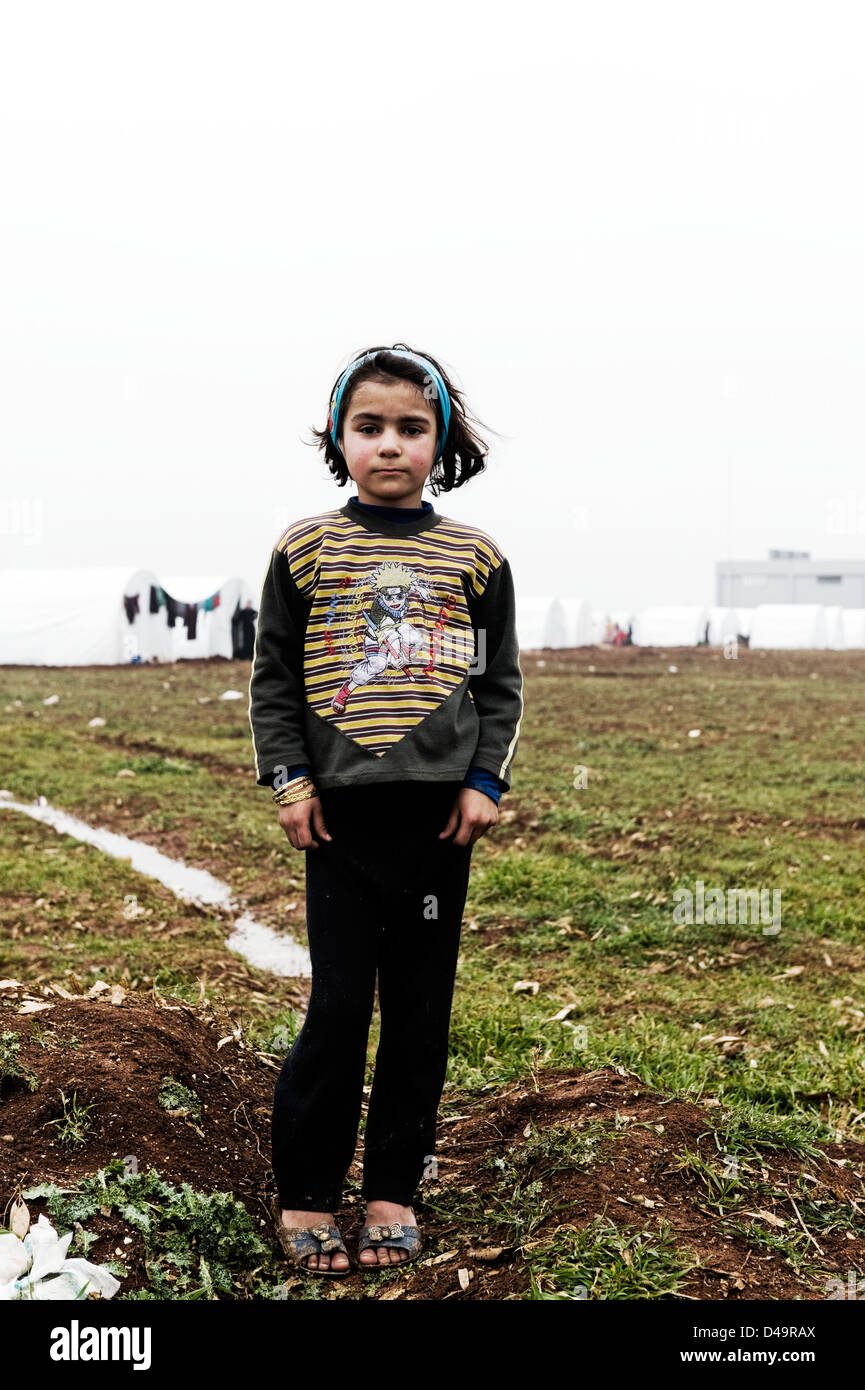 A girl in the Azaz Refugee Camp on the Turkish border, Syria Stock Photo
