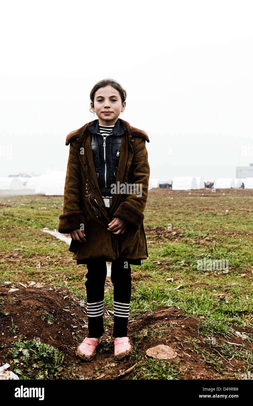 A girl in the Azaz Refugee Camp on the Turkish border, Syria Stock Photo