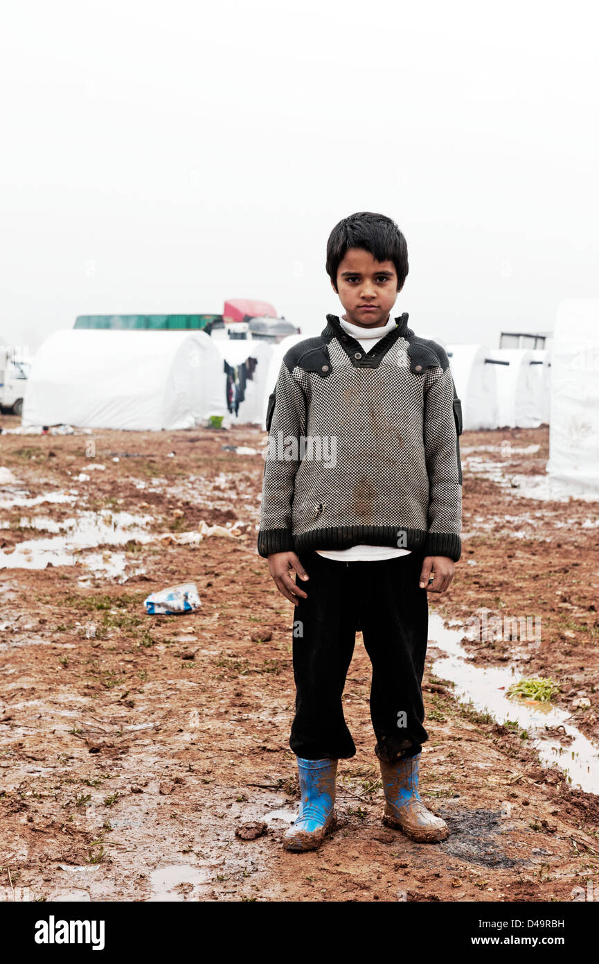 A boy in the Azaz Refugee Camp on the Turkish border, Syria Stock Photo