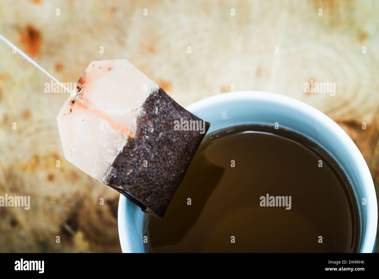 Making a cup of tea, using a teabag on a string Stock Photo Alamy