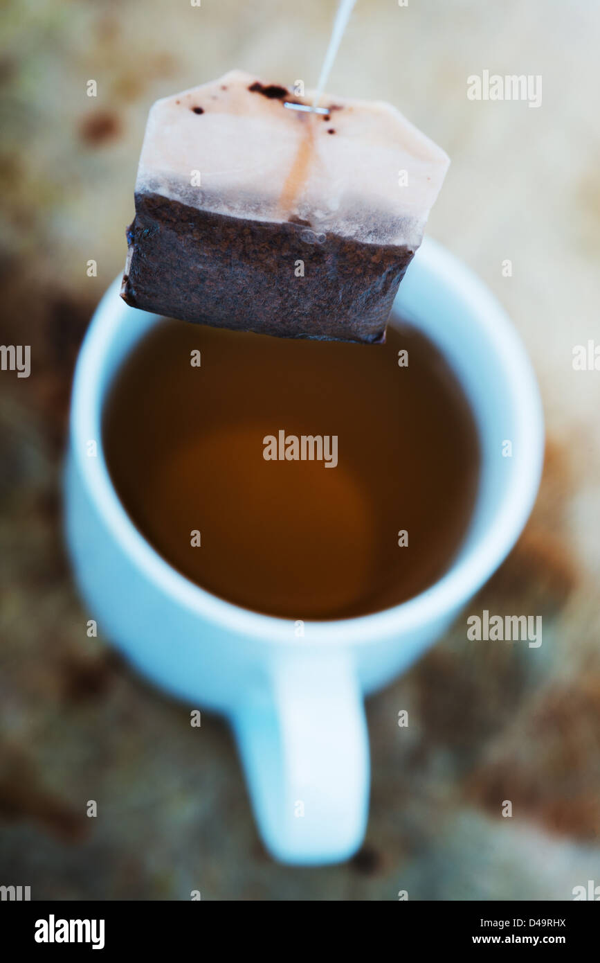 Making a cup of tea, using a teabag on a string Stock Photo Alamy