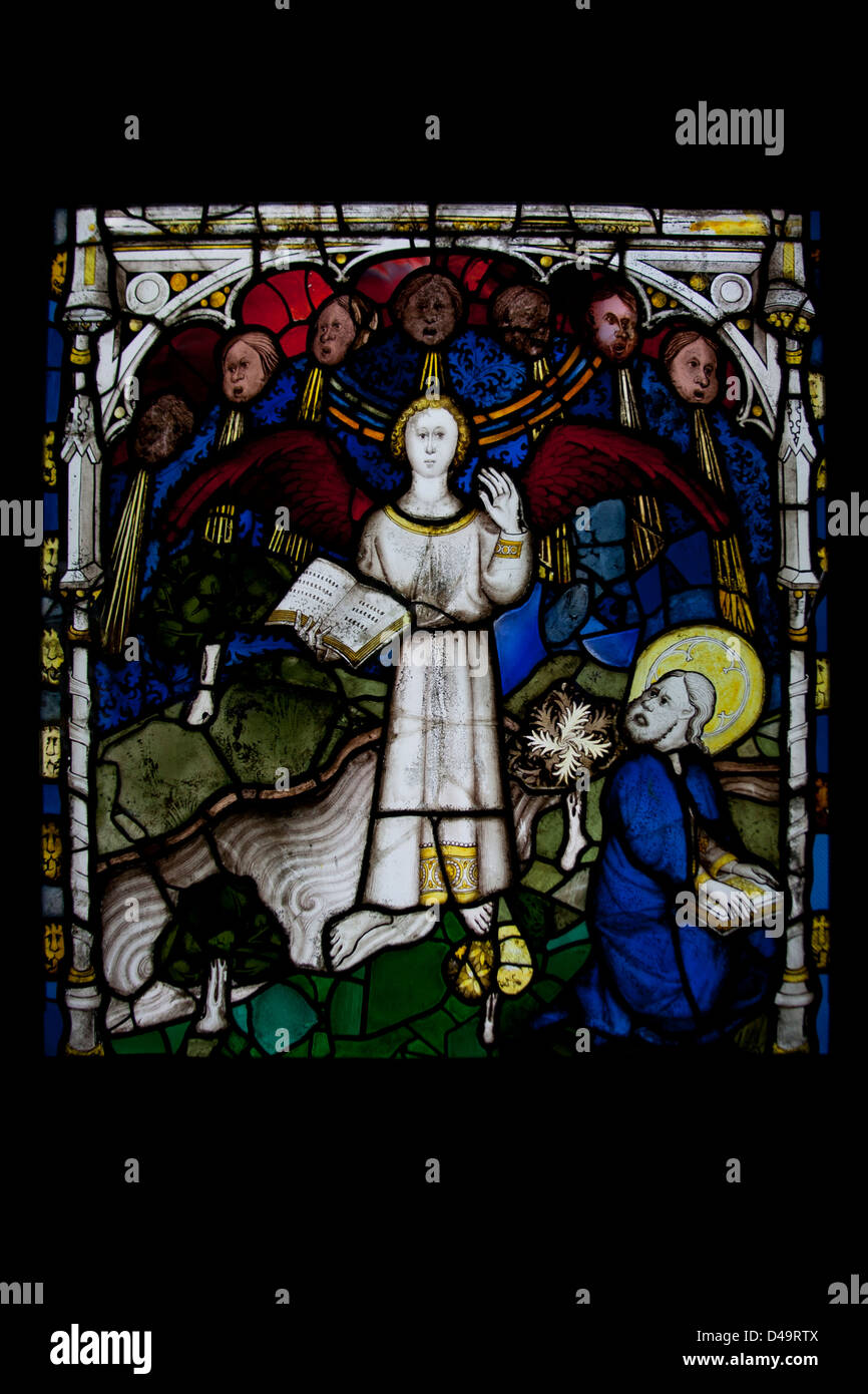 Stained glass window - The Mighty Angel and the Seven Thunders -  in the Orb York Minster, York Yorkshire, England UK Stock Photo