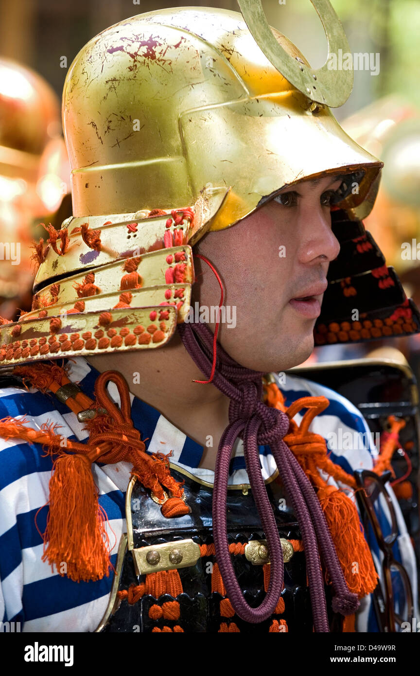 Weekend samurai warrior dressed in armor with helmet partakes in the annual spring Shunki Reitaisai Grand Festival parade, Nikko Stock Photo