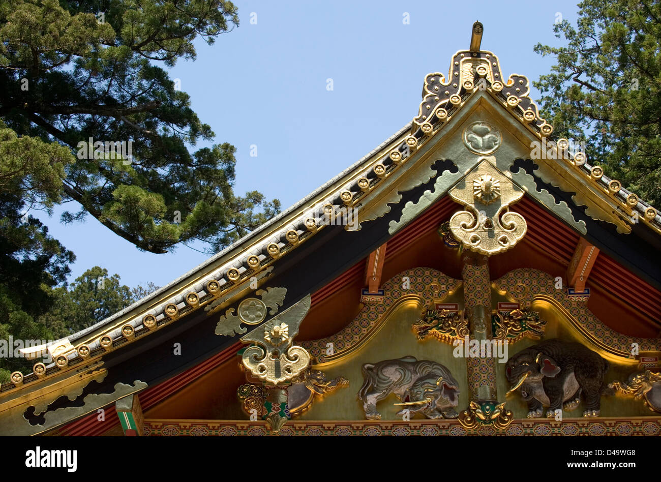 Ornamental gold decorated roof gable at one of the sacred buildings at Toshogu Jinja Shrine in Nikko, Tochigi, Japan. Stock Photo