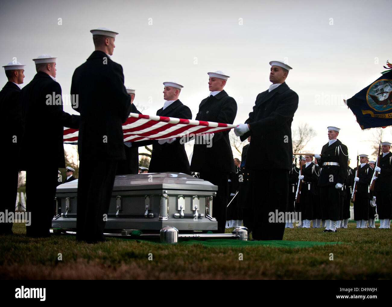 Members of the US Navy Ceremonial Guard escort the caskets during the funeral with full military honors for two Sailors recovered from the ironclad USS Monitor at Arlington National Cemetery  March 8, 2013 in Arlington, VA. The Monitor sank off Cape Hatteras, NC during the Civil War in 1862. Stock Photo