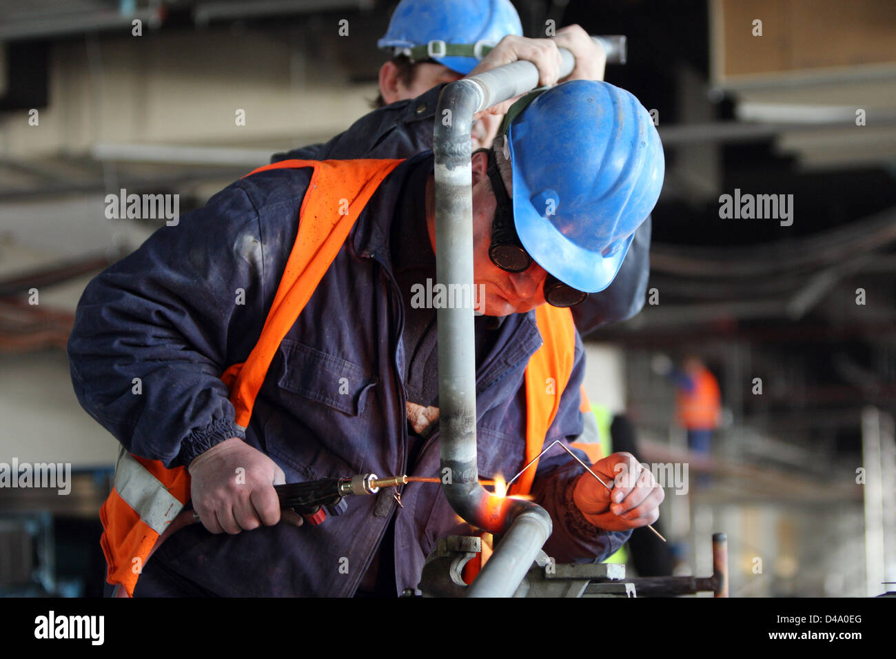 Schoenefeld, Germany, welders on the BBI construction site Stock Photo