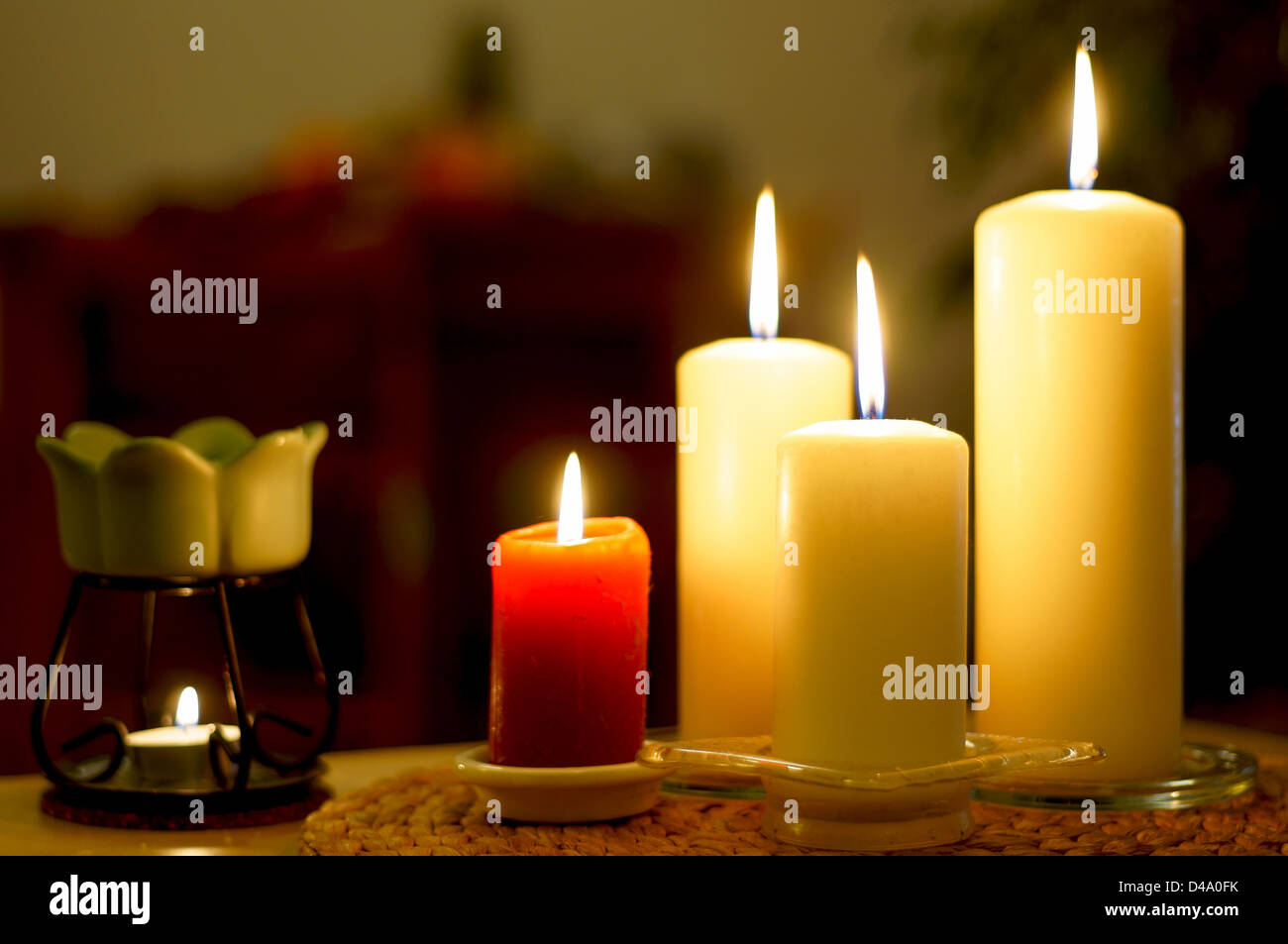 Candles burning homelike comfortable warm light Stock Photo