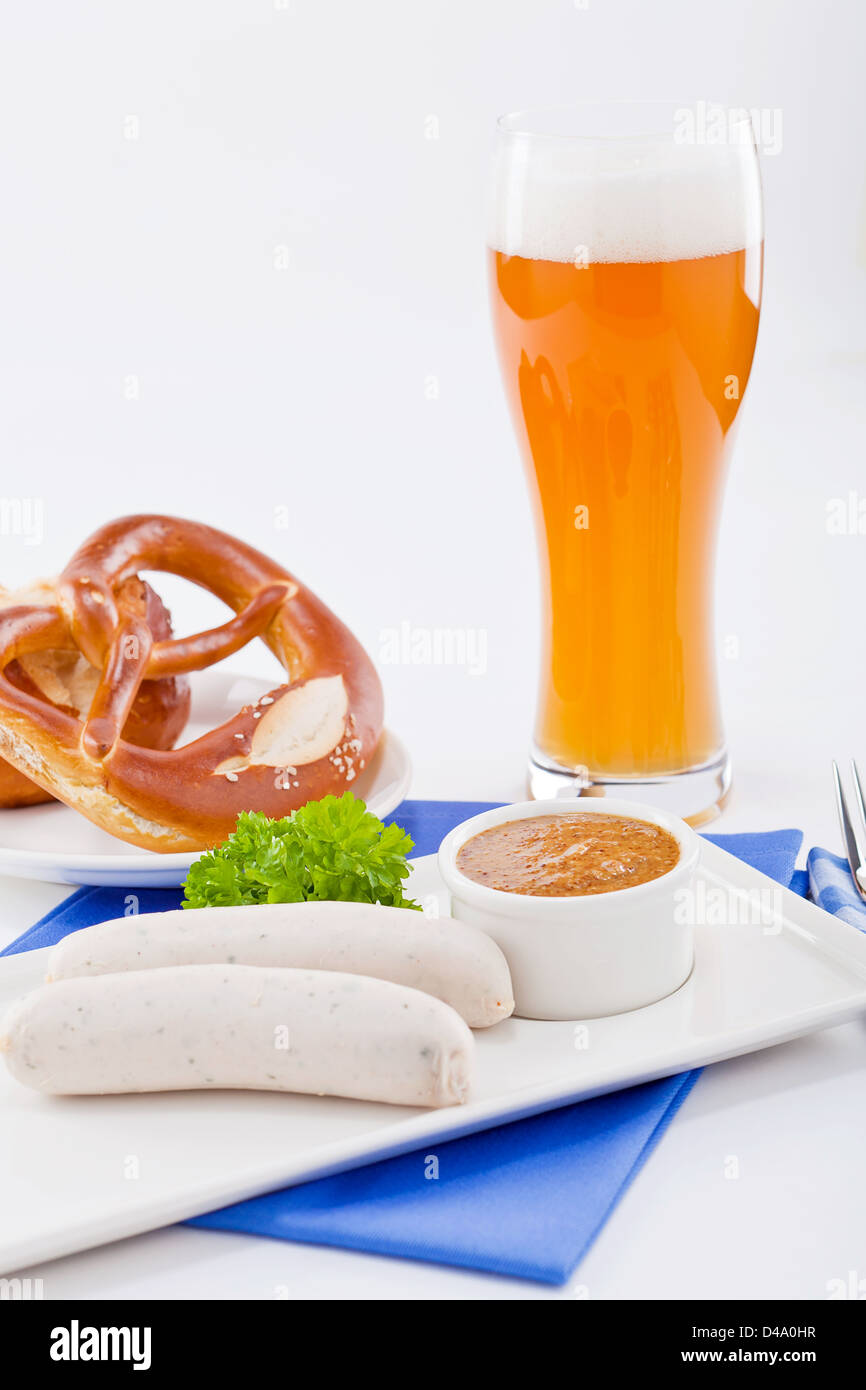 weisswurst white sausages and sweet mustard with pretzel bavarian traditional food Stock Photo
