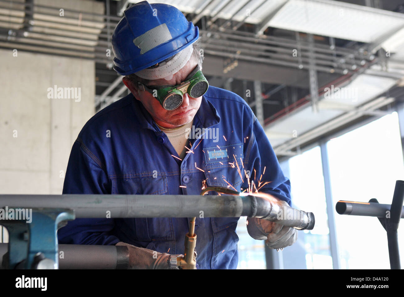Schoenefeld, Germany, welders on the BBI construction site Stock Photo