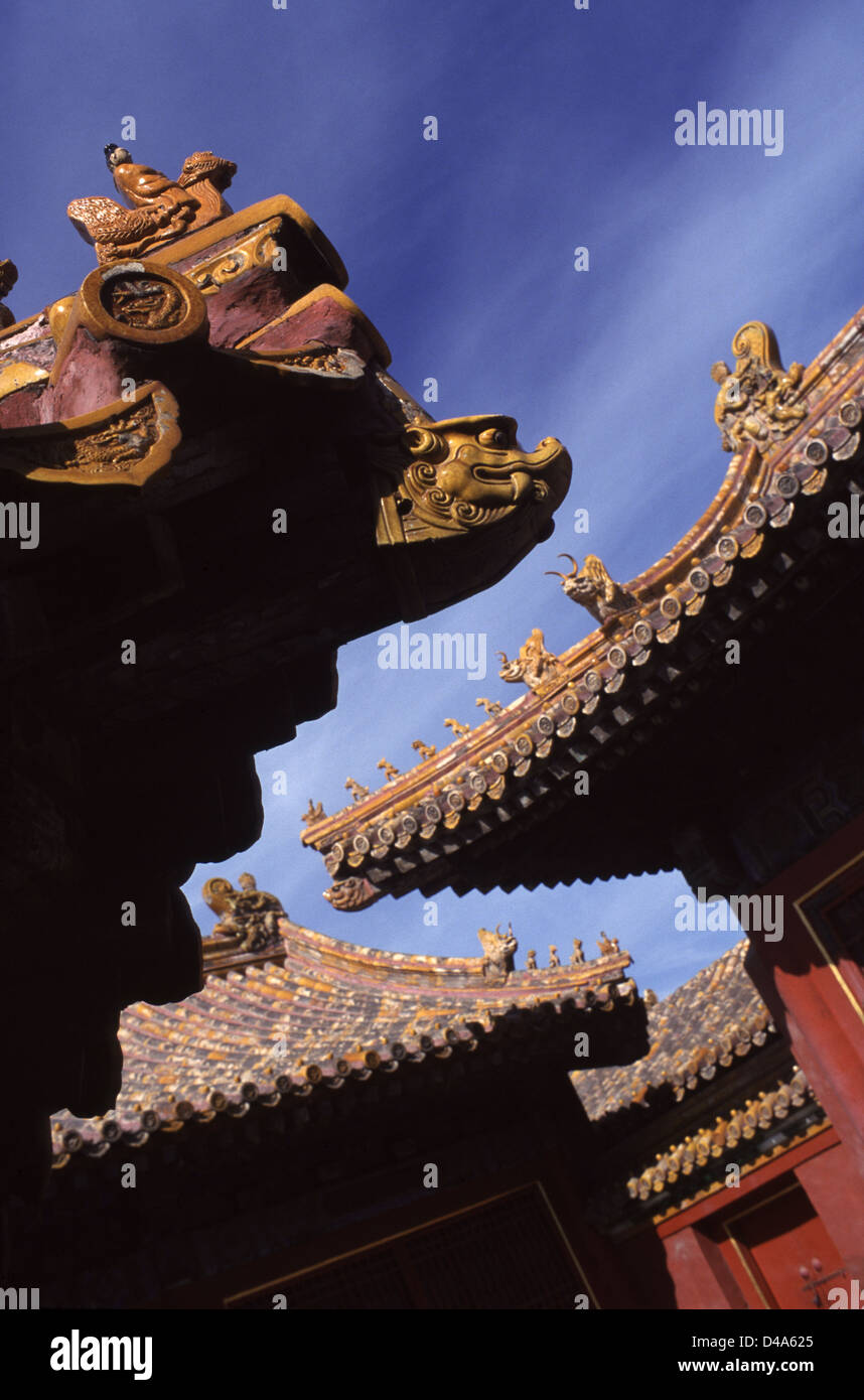 Imperial roof decoration on the roof ridge of the Hall of Supreme Harmony in the historic Forbidden City that was the Chinese imperial palace from the Ming dynasty to the end of the Qing dynasty located at the center of Beijing capital of China Stock Photo
