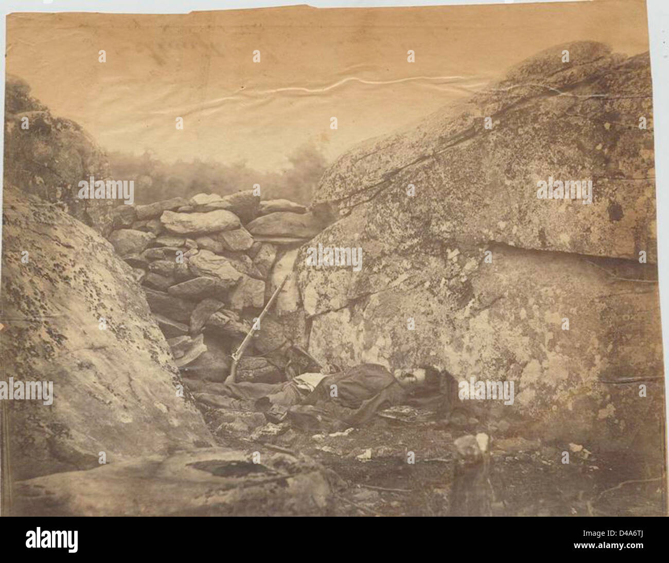 A 1865 photograph taken at the Devil's Den in Gettysburg, showcasing ...