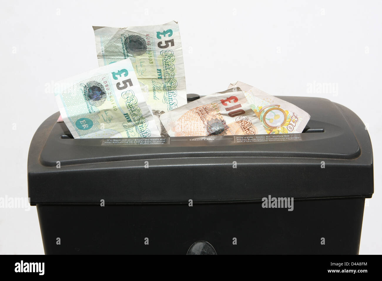 Bank notes being shredded Stock Photo Alamy