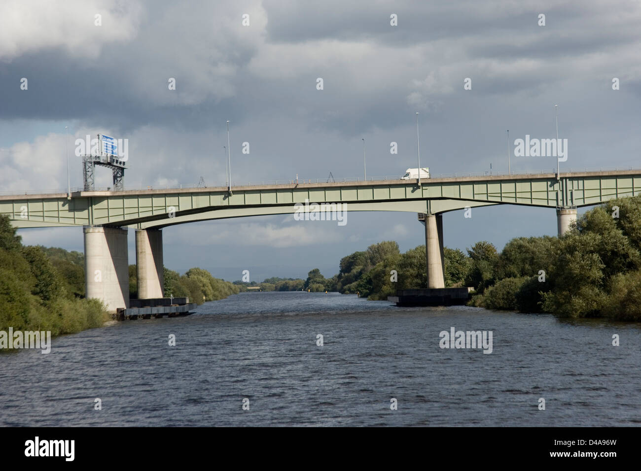 The M62 Thelwall Viaduct Bridge on the Manchester Ship Canal from the Mersey Ferry Stock Photo