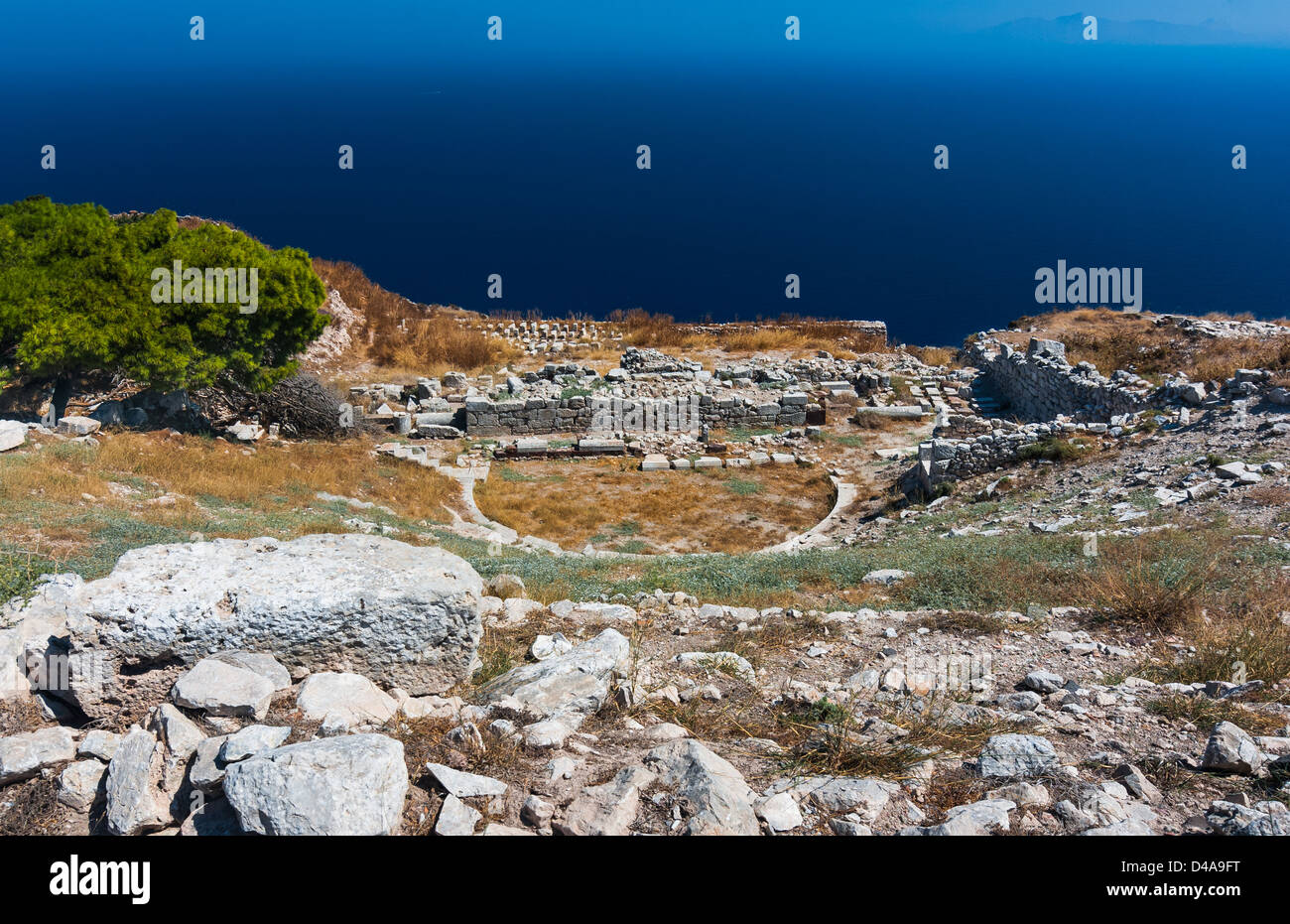 Ancient theater in Thira, built in 2nd century. Santorini island in Cyclades, Aegean Sea of Greece. Stock Photo