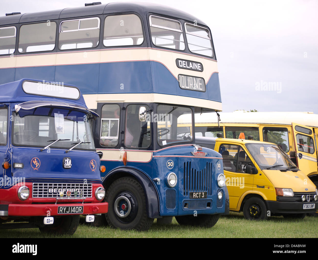Line up of vintage commercial vehicles,including a Leyland bus at Morton rally, June 2011 Stock Photo
