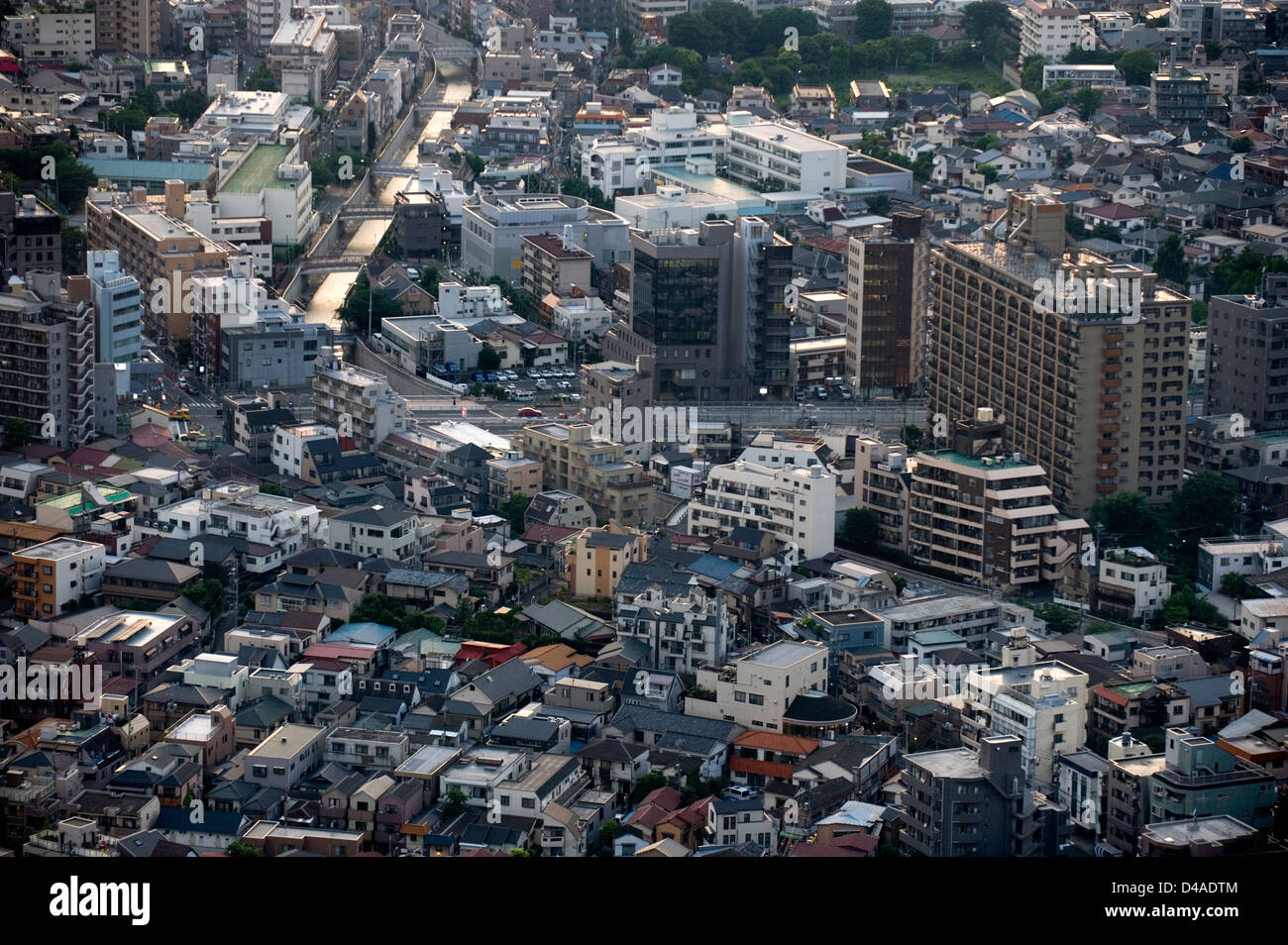 Aerial view of a Tokyo city neighborhood depicting over-crowding, urban sprawl and development. Stock Photo