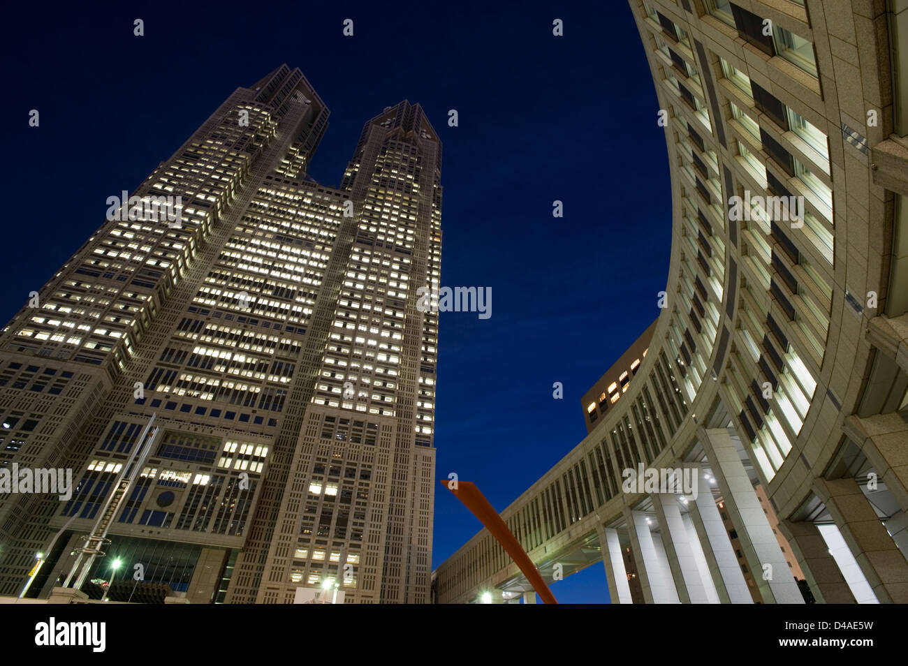 Night view looking up at skyscraper Tokyo Tocho (Tokyo City Metro Government Office Building) in Nishi Shinjuku (West Shinjuku). Stock Photo