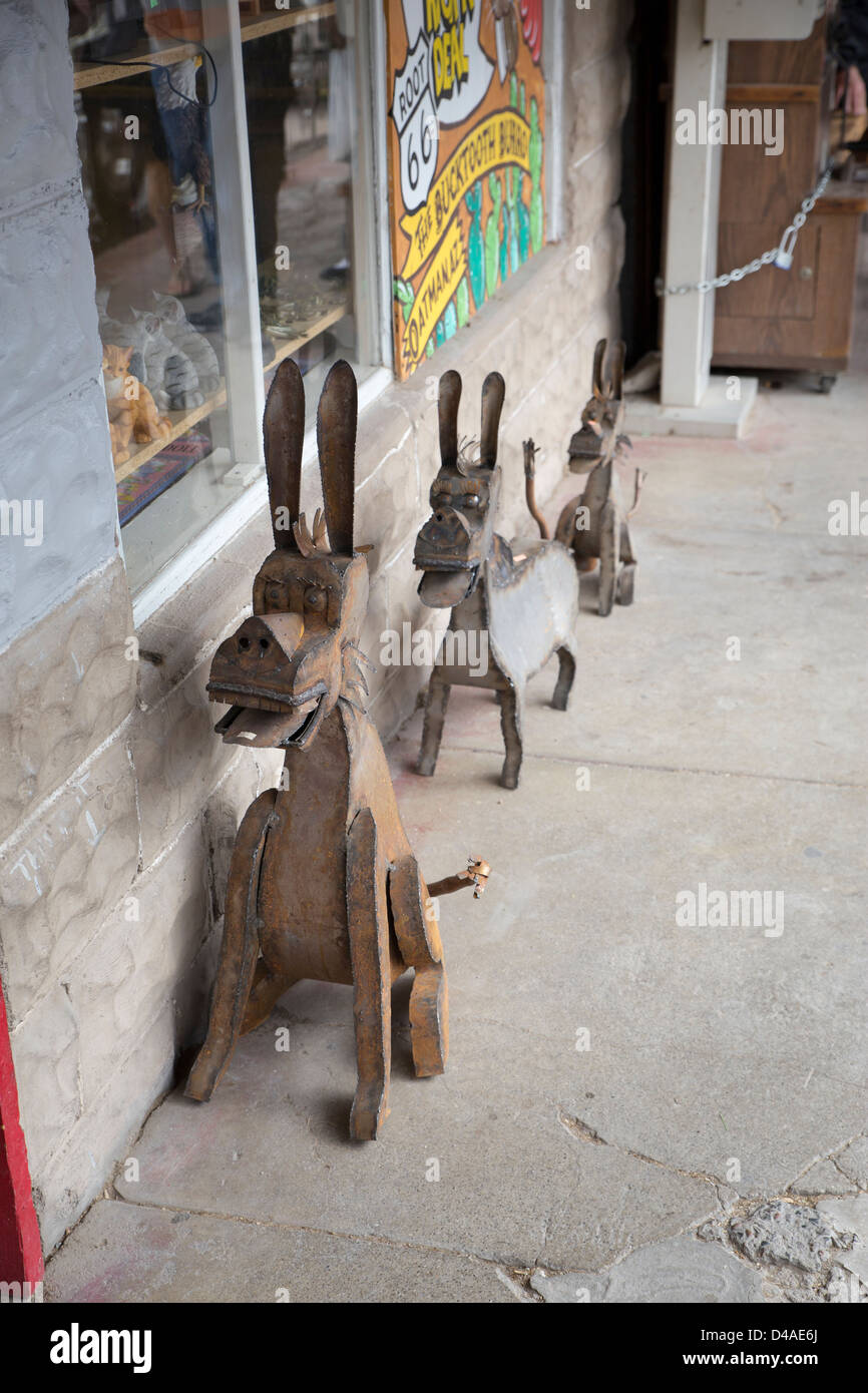 Three donkey metal sculptures outside a shop at route 66 in Oatman