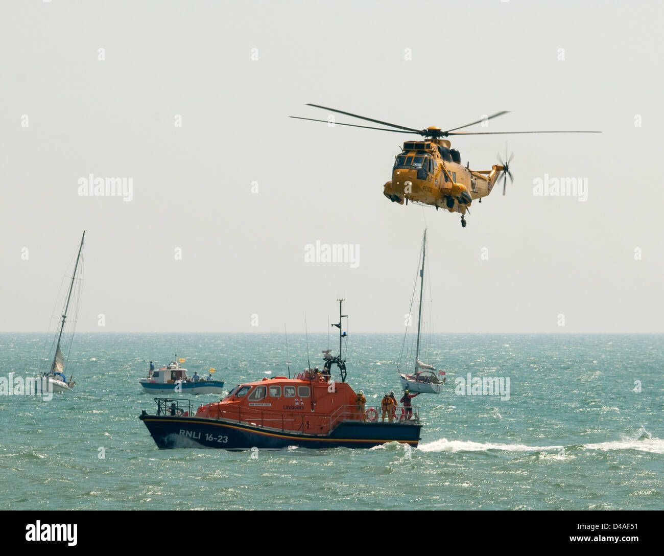 Sea King Rescue Helicopter with RNLI boat Stock Photo