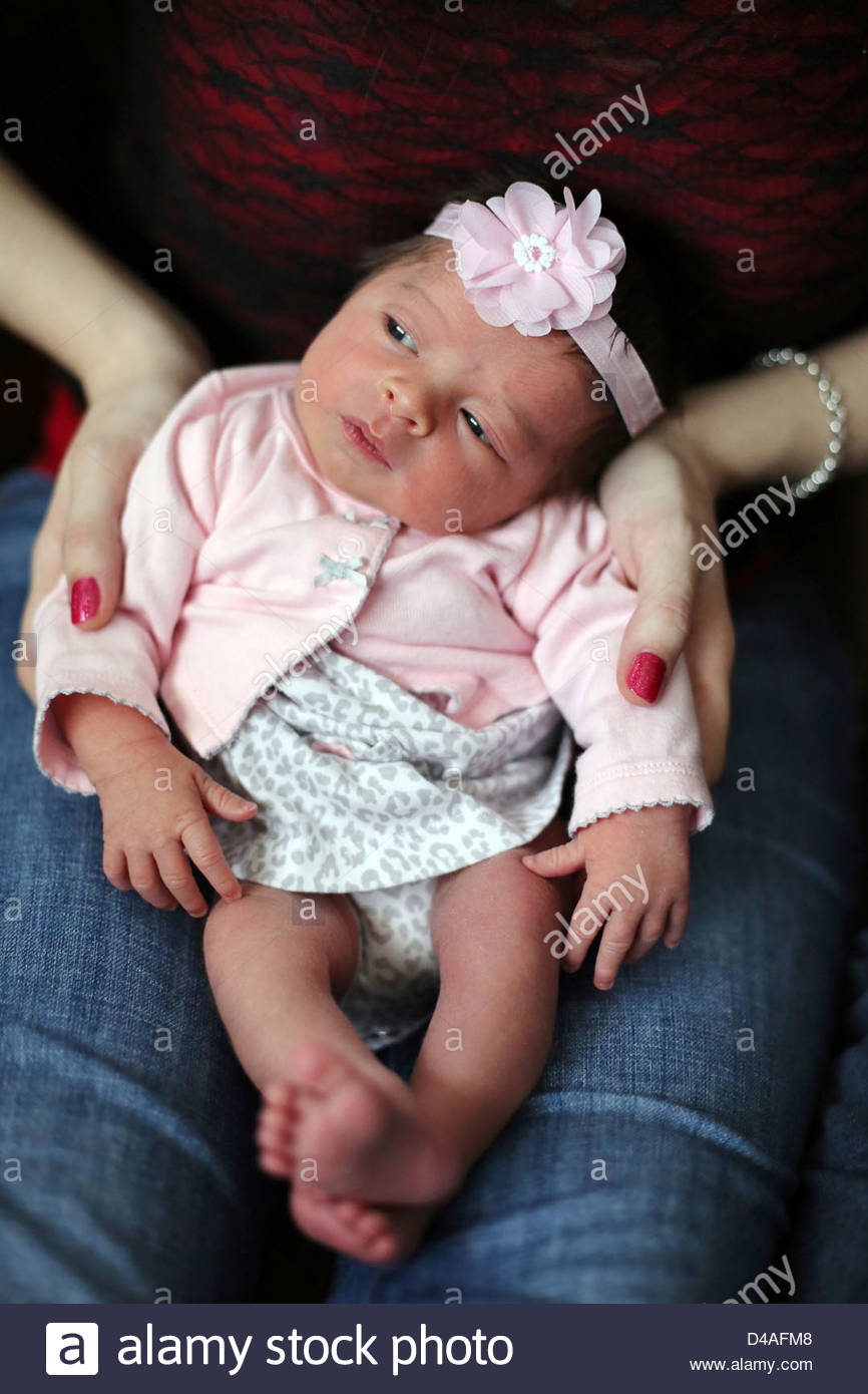 tiny newborn baby girl