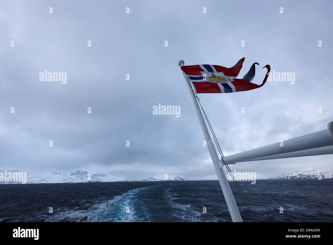 norwegian post postal flag on a ship carrying mail on a cold overcast