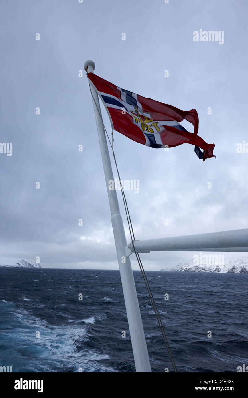 norwegian post postal flag on a ship carrying mail on a cold overcast
