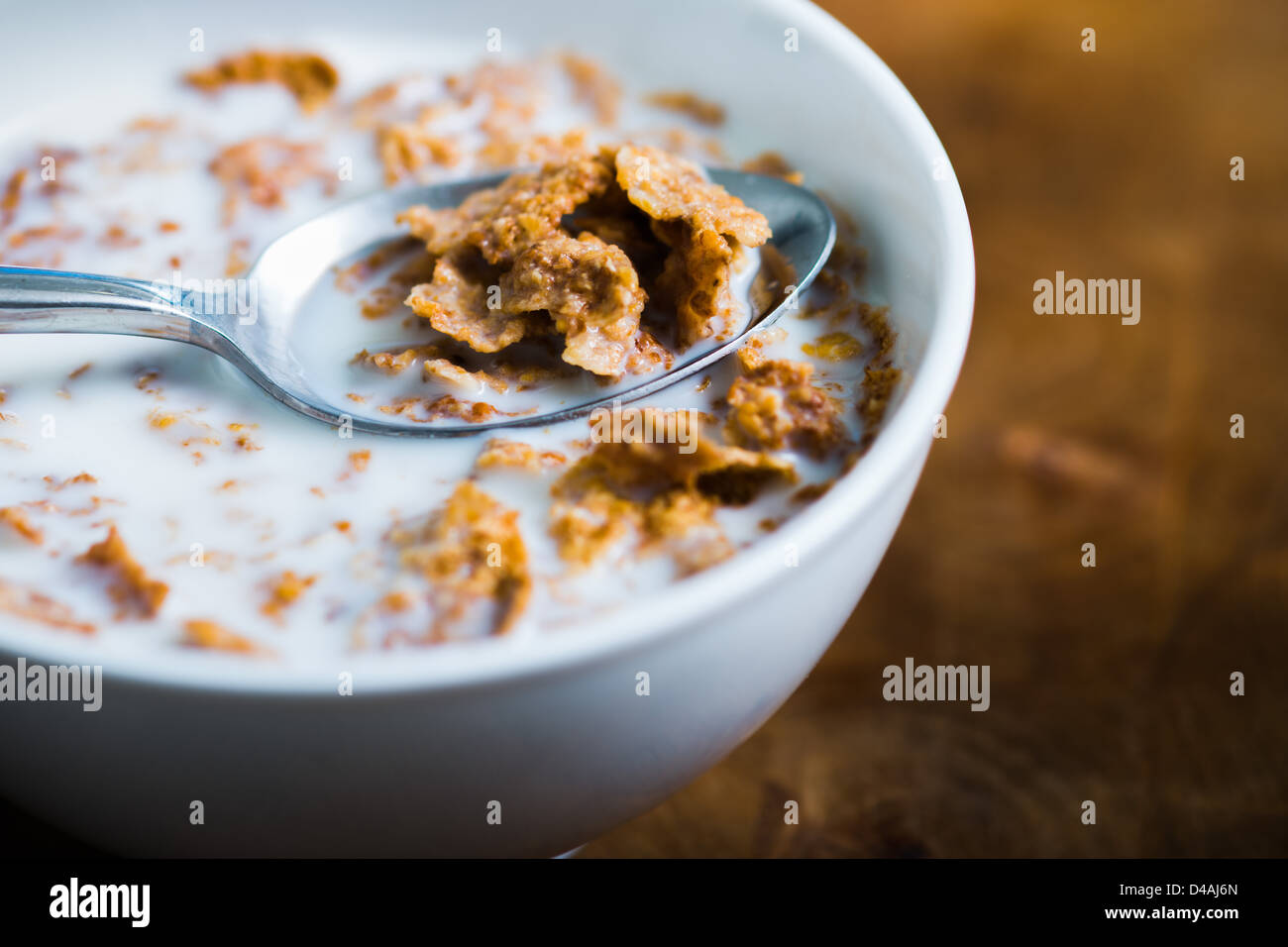 Bran Flakes breakfast cereal with milk Stock Photo Alamy